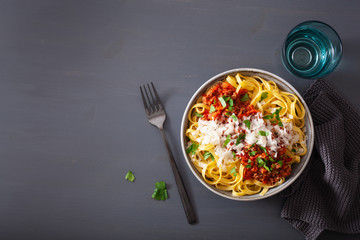 tagliatelle bolognese with herbs and parmesan, italian pasta