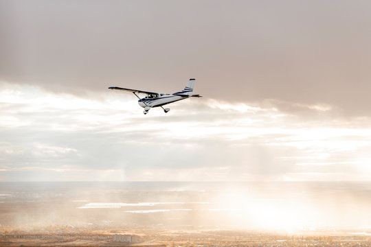Beautiful white biplane in flight