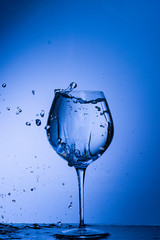 glass, drink, wine, alcohol, water, blue, wineglass, isolated, empty, liquid, beverage, clean, white, transparent, clear, crystal, bar, goblet, cold, celebration, drop, reflection, single, bocal, blac