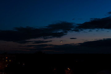 Late evening sky and landscape. Calm summer scenery night with moon. Camping in wilderness. Sunset, sunrise in park. Scenic, picturesque view backdrop, background. Wild forest at nighttime