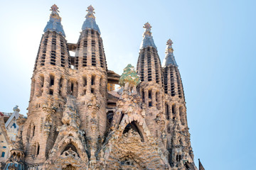 View to the facede of cathedral under bright sun, designed by Antonio Gaudi at May 21, 2016 in...