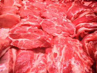 Steaks from beef and pork red meat in market