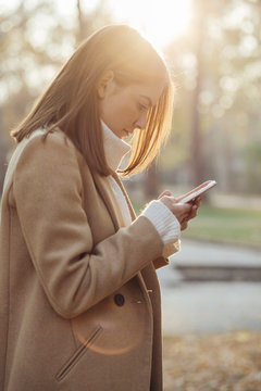 Woman texting on her mobile