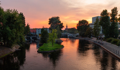 Bydgoszcz. Sunset over the walking boulevards on the river Brda