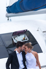 Business couples are celebrating in a yacht, Honeymoon summer trip