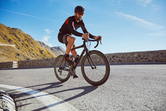 Triathlete training in Alps.