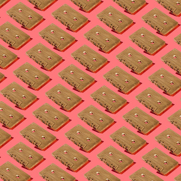 Gold Audio Cassette Pattern on Red