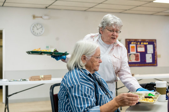 Volunteers Preparing a Community Meal