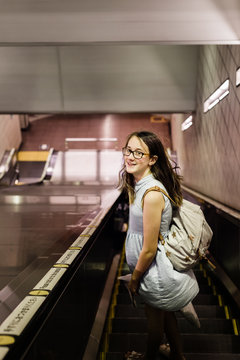 tourist on subway escalator
