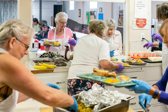 Volunteers Preparing a Community Meal