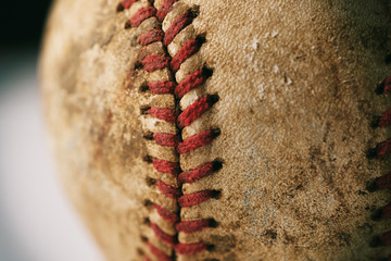 Fototapeta na wymiar Old dirty baseball ball close up for sport concept.