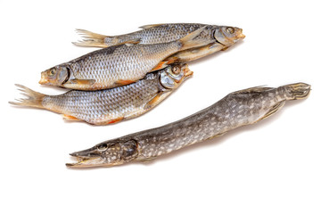 Salty dry fish on white background. Beer snack.