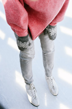 Woman skating on ice rink