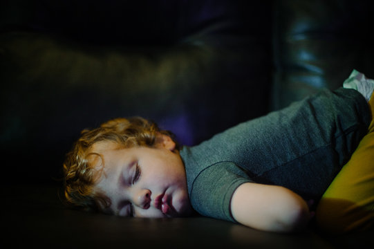 Toddler sleeping On Sofa