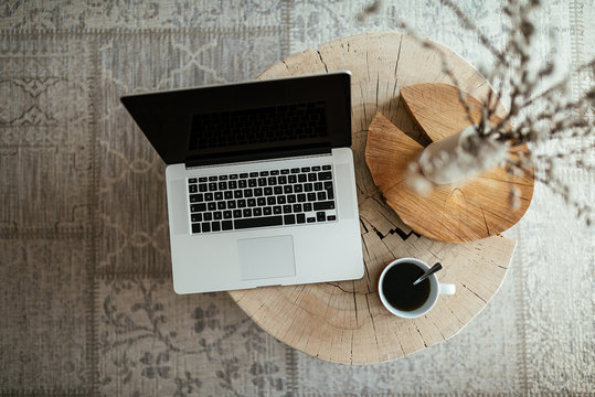 Laptop on a wooden table