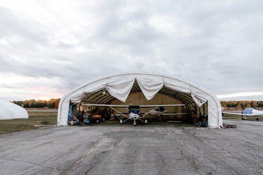Biplane in hangar on aerodrome