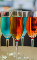 holiday champagne glasses colored stand rows