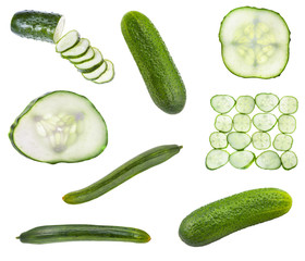 various sliced and whole raw cucumbers isolated