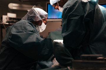 Team of Surgeons Operating in the Hospital