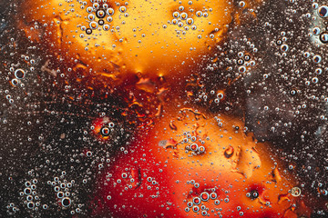  many bubbles. two bright spots on a dark background. abstraction consisting of colorful bright...