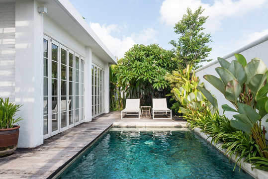 Backyard with swimming pool in luxury villa, Bali