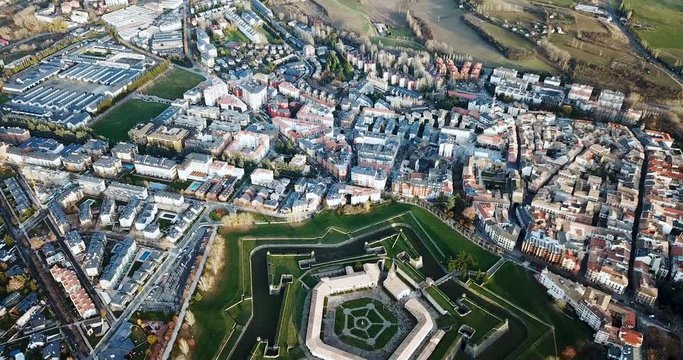 Aerial view of famous Citadel of Jaca on background of cityscape in sunny autumn day, Spain