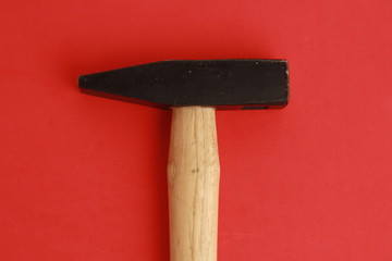 The claw hammer in colorful background