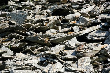 Stacked Slate Rocks Forming a Wall