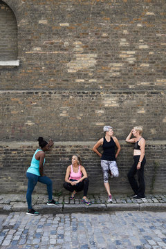 Group mature women chatting workout.