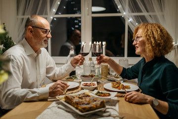 Elegant Senior couple Celebrating Christmas