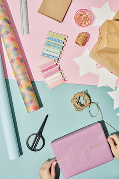Creative Person Wrapping Gift Box