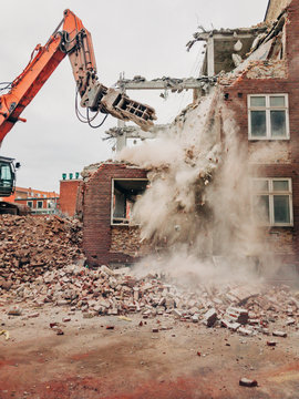 Demolition of an old red masonry building