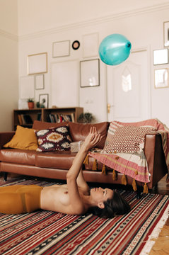 Topless Real Asian Woman Playing with blue Balloon