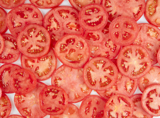 Obraz na płótnie Canvas Tomatoes slices. Healthy natural food, background. Horizontal.