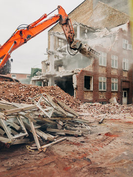 Demolition of an old red masonry building