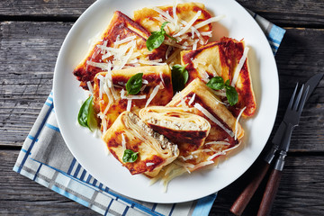 Meat and mushrooms Stuffed Crepes on plate