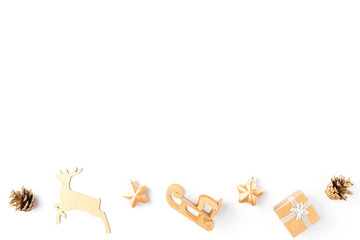 Christmas ornament. Xmas gold decorations isolated on white background. Flat lay, top view. Copy space. Holiday backdrop