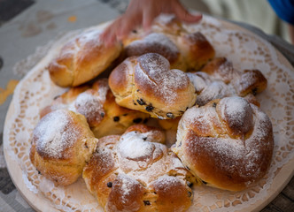 donuts with powdered sugar on plate