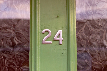 House number 24 on green