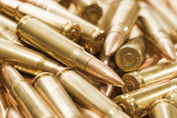 Naklejka premium Heap of golden russian ammo