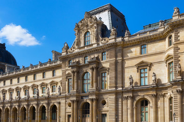 View of the Pavillon Colbert of the Louvre in Paris, France. Is the world's largest art museum and is housed in the Louvre Palace, originally built in the late 12th to 13th century.