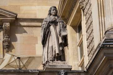 Charles-Louis, Baron de Montesquieu (1689-1755) statue on the Louvre Palace, Paris, France. He was...