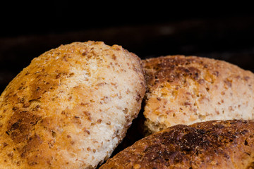 Homemade baked bread on table, closeup