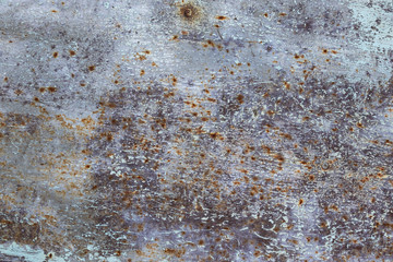Background in the form of a metal sheet in light gray-blue color with many scratches and spots of rust of various shapes.