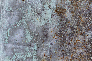 Background in the form of a metal sheet dirty gray-blue color with many scratches and spots of rust of various shapes