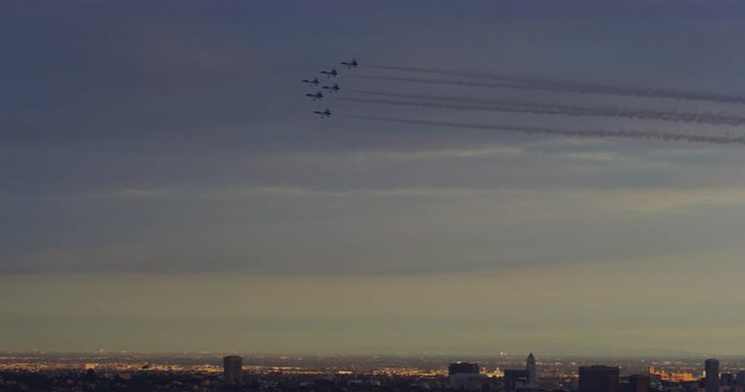 Slow motion of thunderbirds fly over downtown los angeles celebrating upcoming film &lsquo;Captain Marvel&rsquo; representing the honor of the men and women serving in the armed forces in Los Angeles, California. 