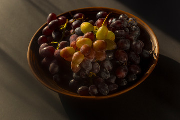  Plate of grapes in the evening sun