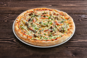 Thick crust pizza with ham, pumpkin and oyster mushrooms
