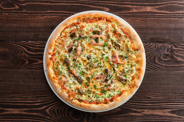 Thick crust pizza with ham, pumpkin and oyster mushrooms