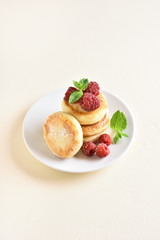 Cottage cheese pancakes with fresh raspberries